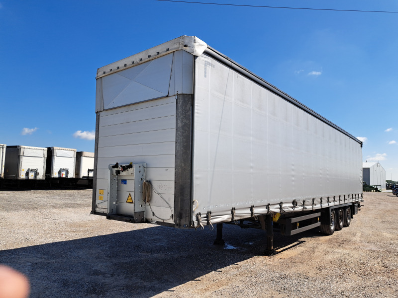SCHMITZ CARGOBULL SCB S3T FIRANA - Remolque con toldo: foto 1 SCHMITZ CARGOBULL SCB S3T FIRANA - Remolque con toldo: foto 1