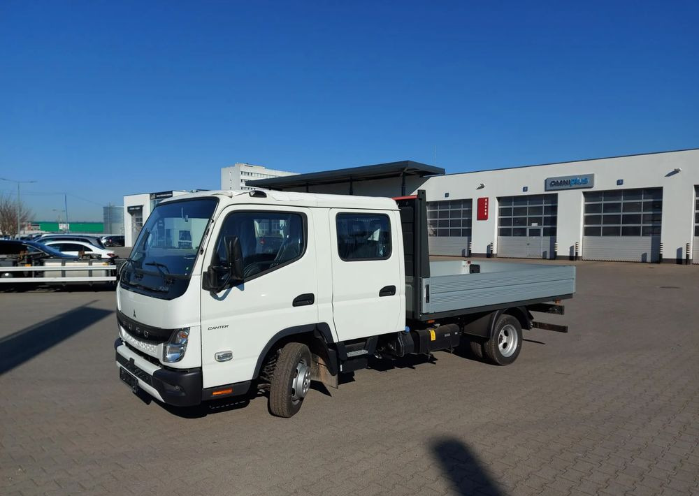 FUSO Canter 3C15D skrzynia - Camión de basura: foto 1 FUSO Canter 3C15D skrzynia - Camión de basura: foto 1