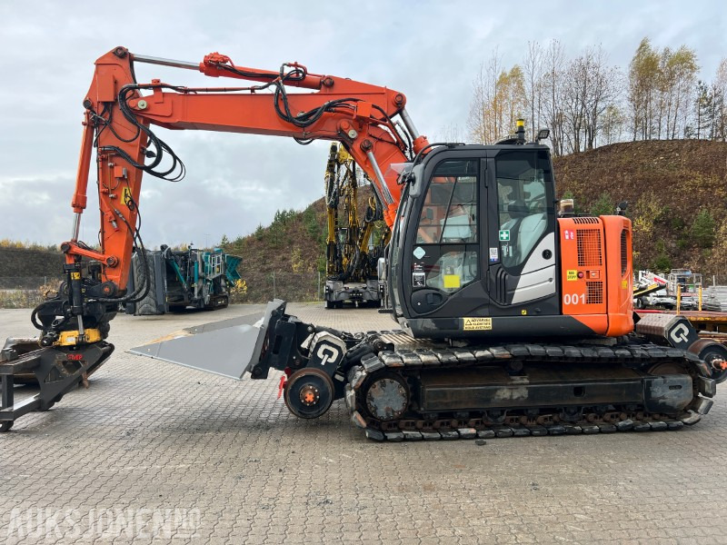 2015 Hitachi ZX135-US Rail maskin med henger, tilt, klype, 6 skuffer, klype - Excavadora: foto 2 2015 Hitachi ZX135-US Rail maskin med henger, tilt, klype, 6 skuffer, klype - Excavadora: foto 2