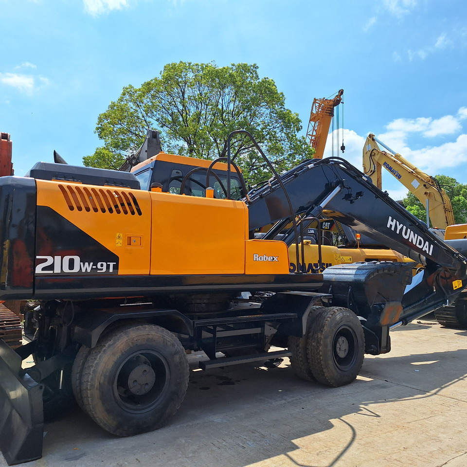 Hyundai 210w-9T wheel excavator - Excavadora de ruedas: foto 1 Hyundai 210w-9T wheel excavator - Excavadora de ruedas: foto 1