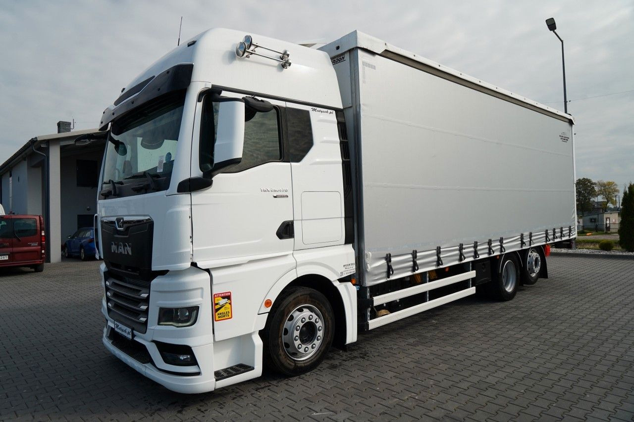 MAN TGX 26.470 / 6x2 / FIRANKA / SOLÓWKA / 6x2 / 12 - Camión lona: foto 2 MAN TGX 26.470 / 6x2 / FIRANKA / SOLÓWKA / 6x2 / 12 - Camión lona: foto 2