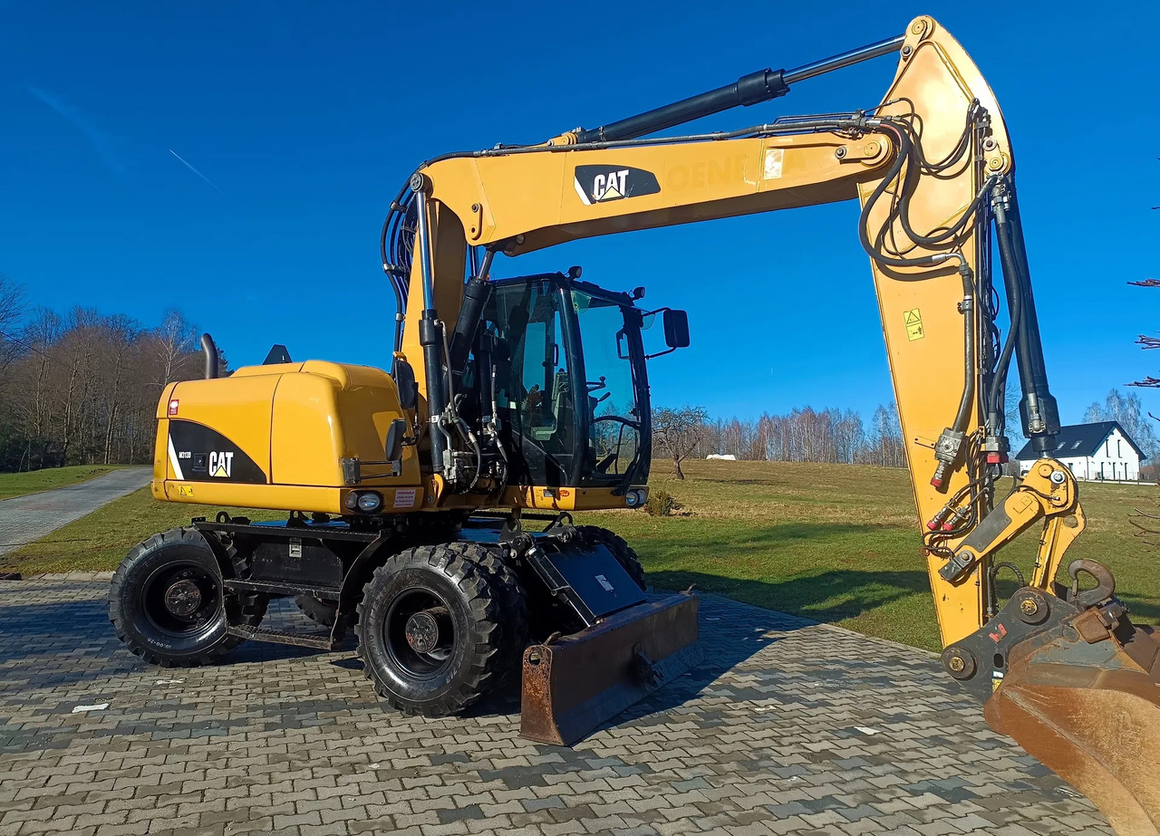 CATERPILLAR M313D - Excavadora de ruedas: foto 2 CATERPILLAR M313D - Excavadora de ruedas: foto 2