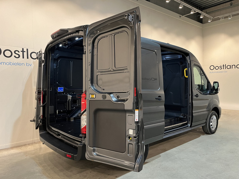 Ford E-Transit 350 L2H2 Trend 68 kWh 184 PK / 100% elektrisch !! / Airco / Cruise Control / CarPlay / Camera / Navigatie / 3-Zits / 220 KM !! Z.G.A.N. ! - Furgón, Furgoneta eléctrica: foto 4 Ford E-Transit 350 L2H2 Trend 68 kWh 184 PK / 100% elektrisch !! / Airco / Cruise Control / CarPlay / Camera / Navigatie / 3-Zits / 220 KM !! Z.G.A.N. ! - Furgón, Furgoneta eléctrica: foto 4