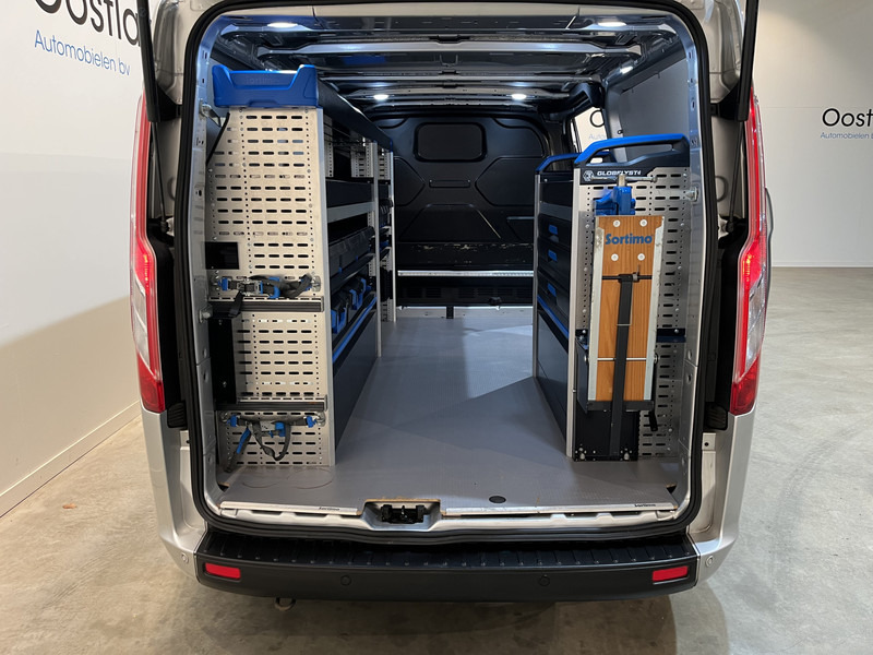 Ford Transit Custom 300 2.0 TDCI L2H1 Trend 130 PK Servicebus / Sortimo Inrichting / Euro 6 / Airco / Cruise Control / Klep / PDC / 3-Zits - Furgoneta pequeña: foto 4 Ford Transit Custom 300 2.0 TDCI L2H1 Trend 130 PK Servicebus / Sortimo Inrichting / Euro 6 / Airco / Cruise Control / Klep / PDC / 3-Zits - Furgoneta pequeña: foto 4
