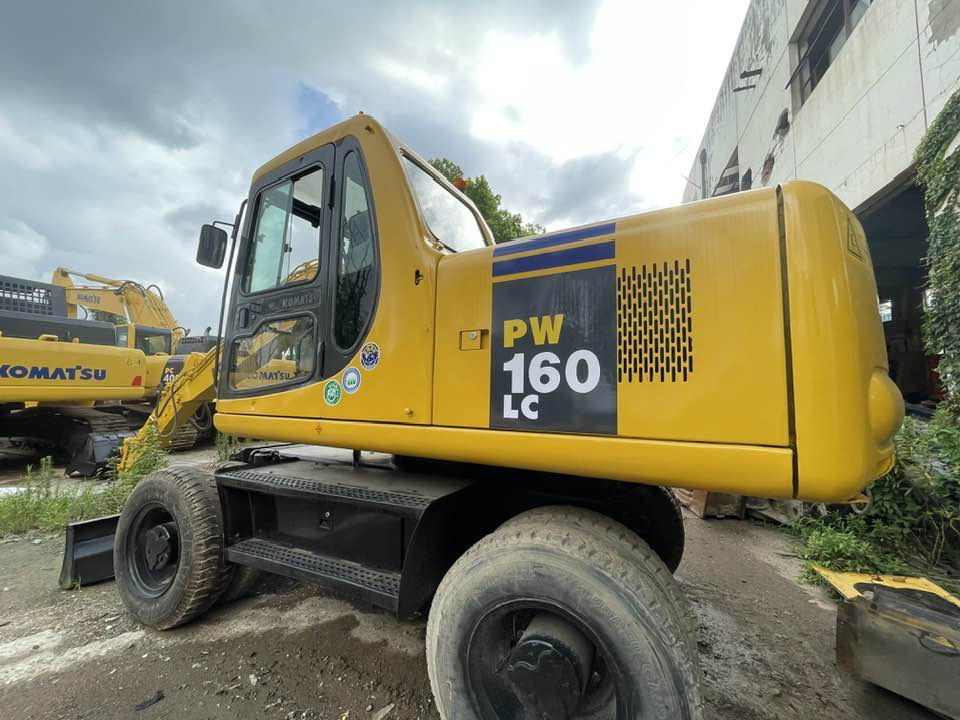 Komatsu PC160LC - Excavadora de ruedas: foto 1 Komatsu PC160LC - Excavadora de ruedas: foto 1