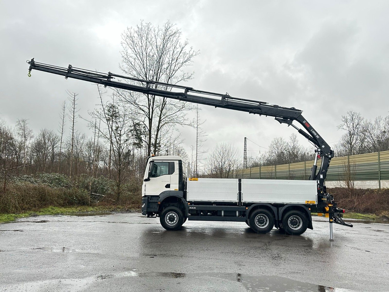 MAN TGS 33.440 6x6 Kran HIAB X-HiPro 302 E 6 - Camión grúa: foto 1 MAN TGS 33.440 6x6 Kran HIAB X-HiPro 302 E 6 - Camión grúa: foto 1