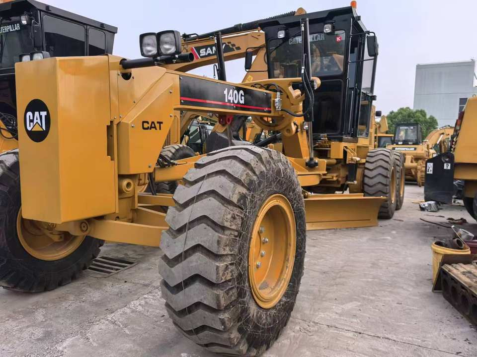 Second Hand Used Construction Machinery Japanese CAT 140G Grader Caterpillar Brand for Sale With Good Condition and Price - Grader: foto 2 Second Hand Used Construction Machinery Japanese CAT 140G Grader Caterpillar Brand for Sale With Good Condition and Price - Grader: foto 2