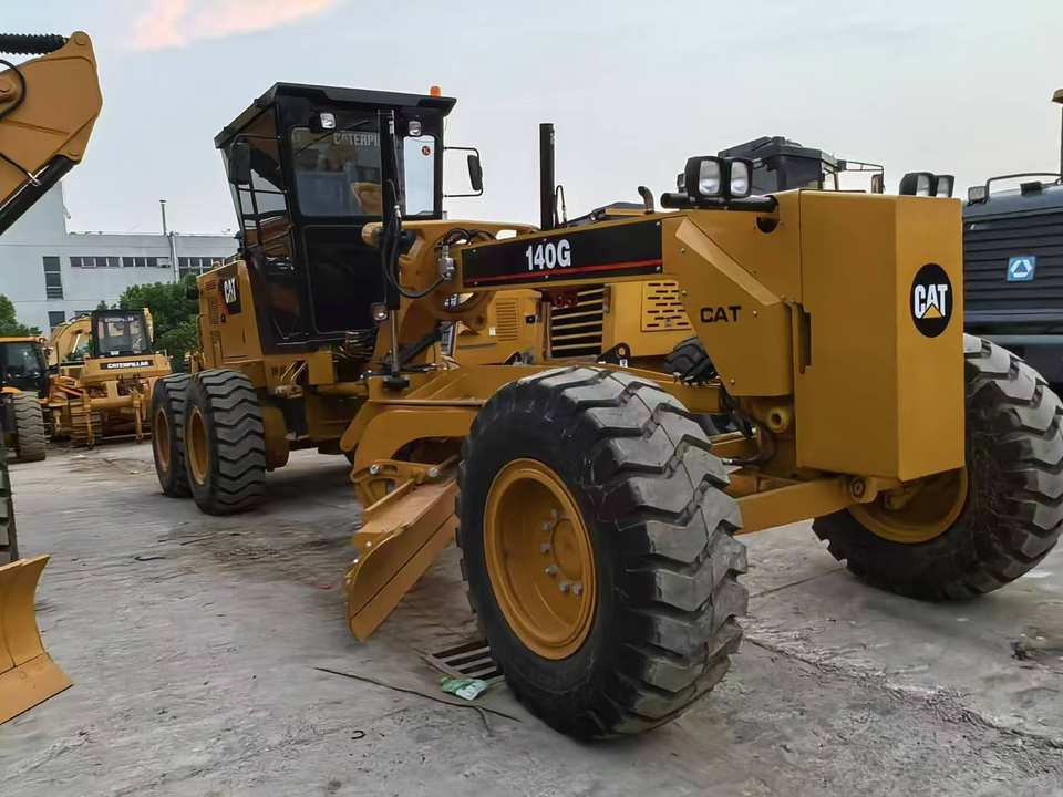 Second Hand Used Construction Machinery Japanese CAT 140G Grader Caterpillar Brand for Sale With Good Condition and Price - Grader: foto 4 Second Hand Used Construction Machinery Japanese CAT 140G Grader Caterpillar Brand for Sale With Good Condition and Price - Grader: foto 4