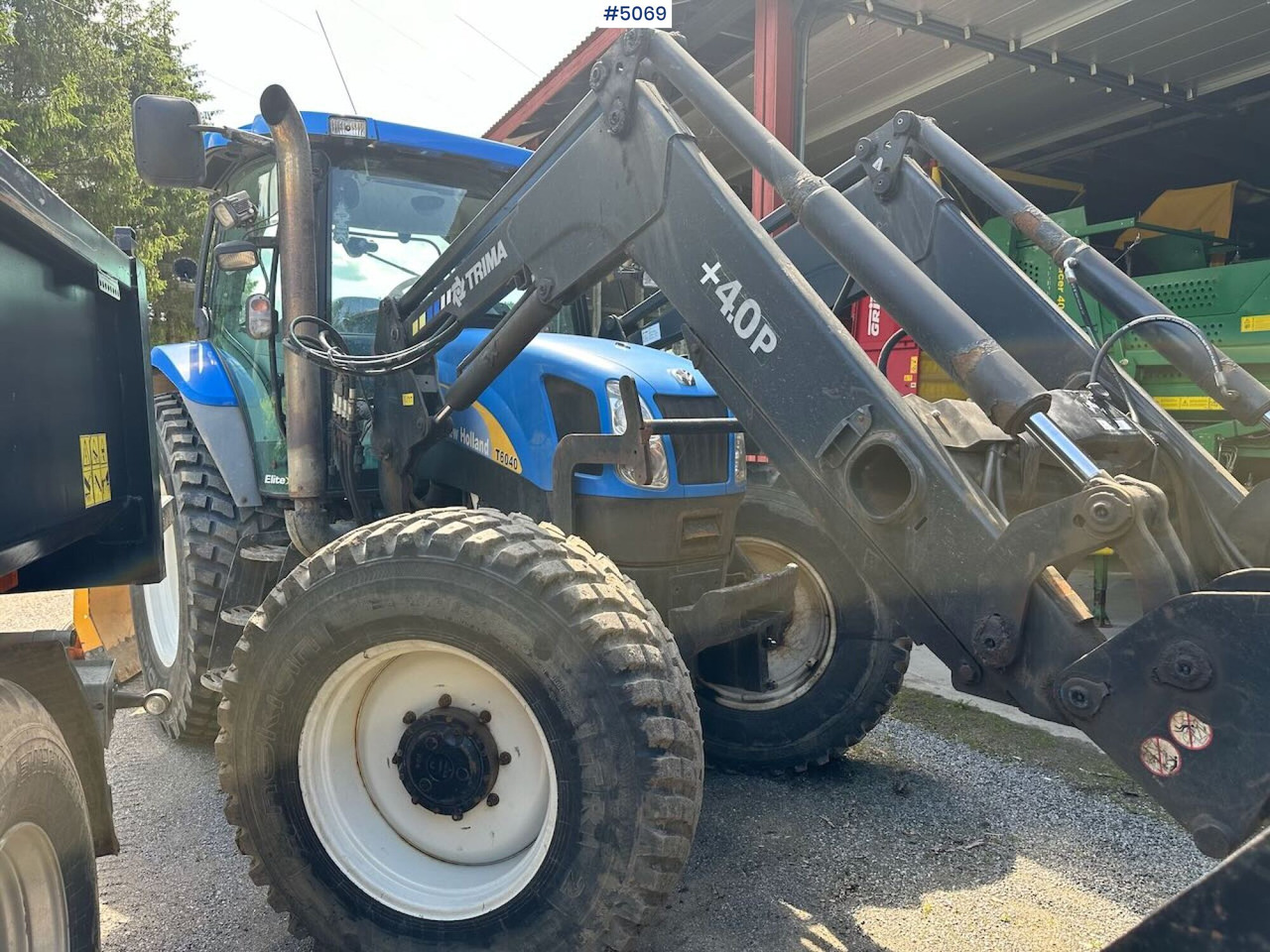 Tractor 2009 New Holland T6040 SS w/ Trima front loader: foto 6 Tractor 2009 New Holland T6040 SS w/ Trima front loader: foto 6