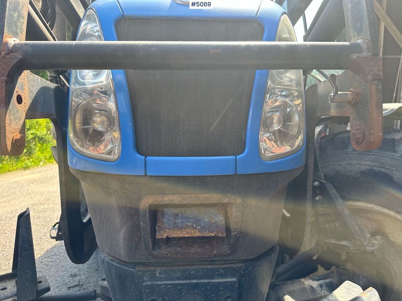 Tractor 2009 New Holland T6040 SS w/ Trima front loader: foto 10 Tractor 2009 New Holland T6040 SS w/ Trima front loader: foto 10