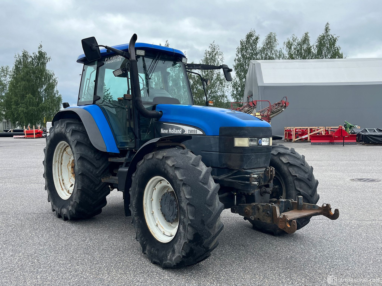 New Holland TM155, traktori etunostolaitteeella, 2004,, Salo - Maquinaria agrícola: foto 4 New Holland TM155, traktori etunostolaitteeella, 2004,, Salo - Maquinaria agrícola: foto 4