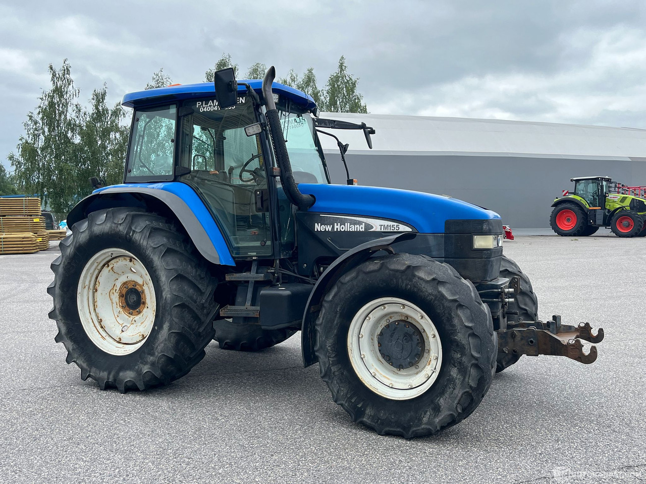 New Holland TM155, traktori etunostolaitteeella, 2004,, Salo - Maquinaria agrícola: foto 3 New Holland TM155, traktori etunostolaitteeella, 2004,, Salo - Maquinaria agrícola: foto 3