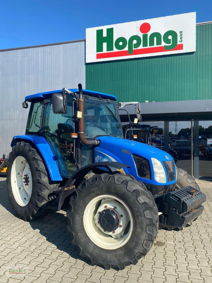 New Holland TL90A - Tractor: foto 1 New Holland TL90A - Tractor: foto 1
