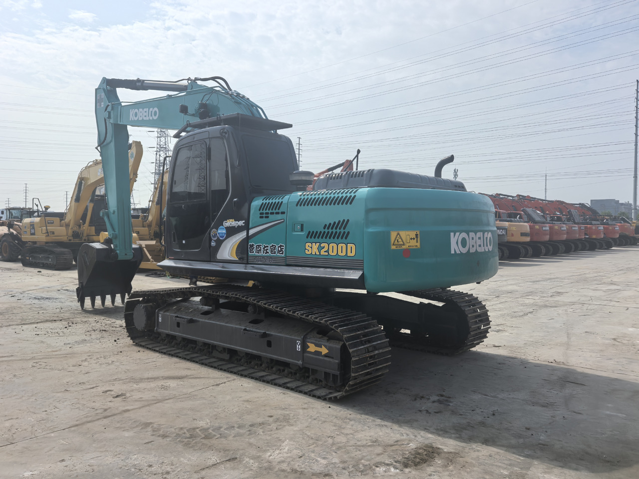 KOBELCO SK200 - Excavadora de cadenas: foto 1 KOBELCO SK200 - Excavadora de cadenas: foto 1