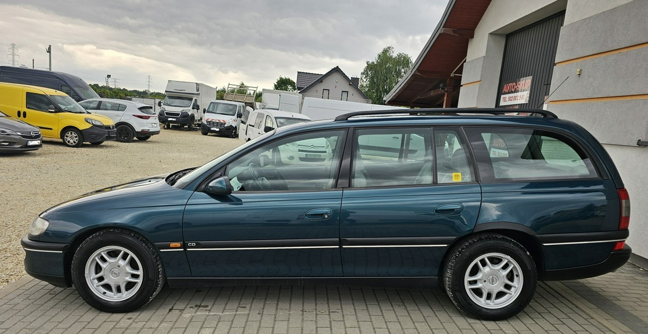 Opel Omega B 2,5 v6 *automat* napęd tył *welury* - Coche: foto 4 Opel Omega B 2,5 v6 *automat* napęd tył *welury* - Coche: foto 4