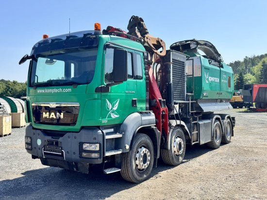 MAN TGS 35.540 8x4 mit Komptech-Zusatzeinheit - Maquinaria forestal, Camión: foto 1 MAN TGS 35.540 8x4 mit Komptech-Zusatzeinheit - Maquinaria forestal, Camión: foto 1