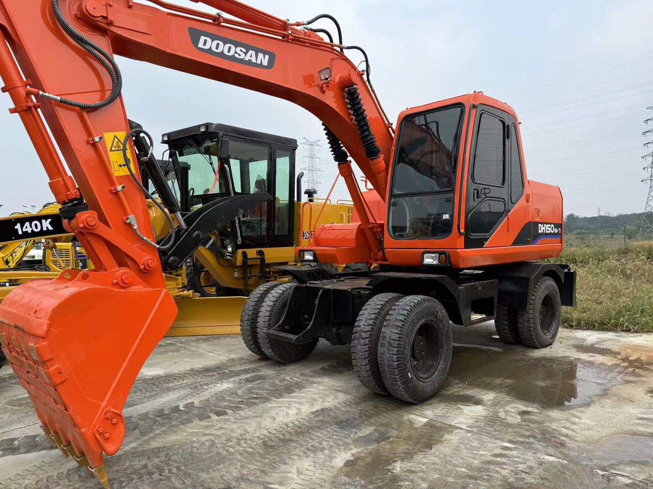 DOOSAN Good Condition Original Doosan DH150w-7 Wheel Excavator 15 Tons Used Doosan Dh150w-7 Excavator Used Wheel Excavator for Sale - Excavadora de ruedas: foto 1 DOOSAN Good Condition Original Doosan DH150w-7 Wheel Excavator 15 Tons Used Doosan Dh150w-7 Excavator Used Wheel Excavator for Sale - Excavadora de ruedas: foto 1