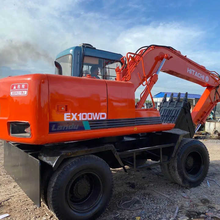 Used Hitachi Ex100WD Wheel Excavator for Sale Japan Made Hitachi Ex100wd Wheeled Excavator for Sale - Excavadora de ruedas: foto 1 Used Hitachi Ex100WD Wheel Excavator for Sale Japan Made Hitachi Ex100wd Wheeled Excavator for Sale - Excavadora de ruedas: foto 1
