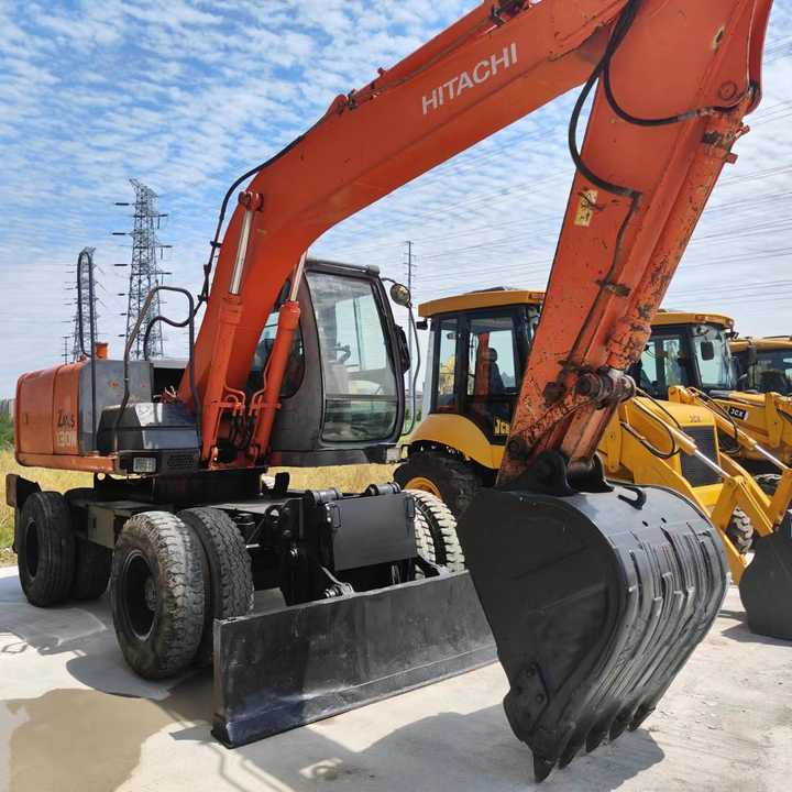 Used Japan Original Brand Hitachi Zx 130w Wheel Excavator Hitachi Zx120 130 200 Excavator for Sale - Excavadora de ruedas: foto 2 Used Japan Original Brand Hitachi Zx 130w Wheel Excavator Hitachi Zx120 130 200 Excavator for Sale - Excavadora de ruedas: foto 2