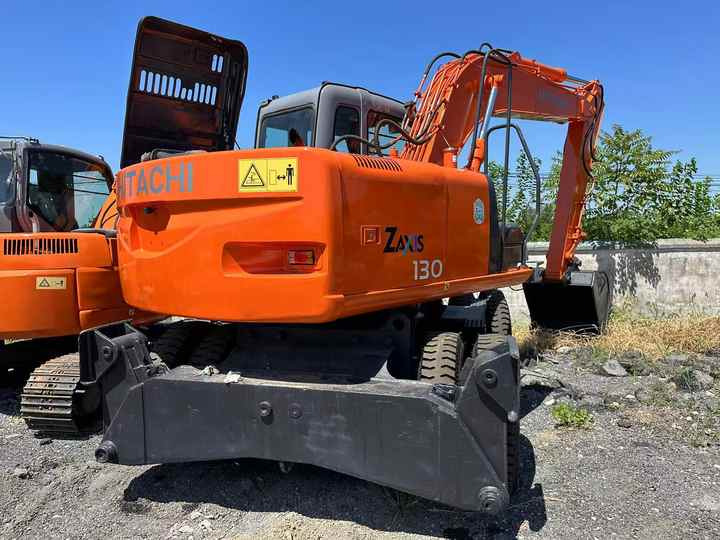 Used Wheel Excavator Hitachi ZX 130W Made in Japan 13ton Hitachi Zx130w Wheel Excavator Price Used Hitachi Zx130 Excavator SALE - Excavadora de ruedas: foto 2 Used Wheel Excavator Hitachi ZX 130W Made in Japan 13ton Hitachi Zx130w Wheel Excavator Price Used Hitachi Zx130 Excavator SALE - Excavadora de ruedas: foto 2