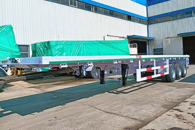 TITAN 3 Axle 40 Ft Flatbed Trailer for Sale in Mauritania - Semirremolque plataforma/ Caja abierta: foto 3 TITAN 3 Axle 40 Ft Flatbed Trailer for Sale in Mauritania - Semirremolque plataforma/ Caja abierta: foto 3