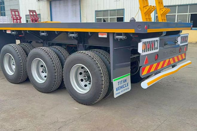 TITAN 3 Axle Flatbed Semi Trailer for Sale in Ghana - Semirremolque plataforma/ Caja abierta: foto 3 TITAN 3 Axle Flatbed Semi Trailer for Sale in Ghana - Semirremolque plataforma/ Caja abierta: foto 3