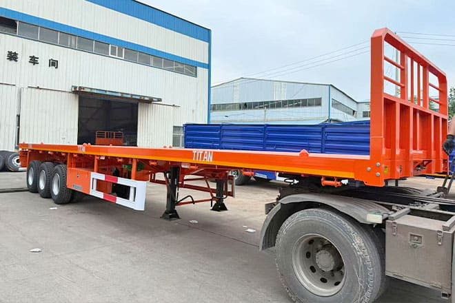 TITAN 40Ft Flatbed Trailer for Sale Price in Jamaica - Semirremolque plataforma/ Caja abierta: foto 1 TITAN 40Ft Flatbed Trailer for Sale Price in Jamaica - Semirremolque plataforma/ Caja abierta: foto 1