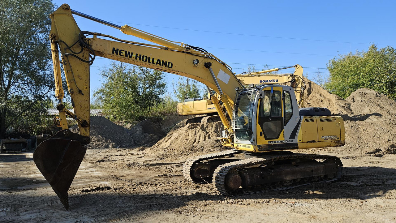 NEW HOLLAND E 245 B - Excavadora de cadenas: foto 2 NEW HOLLAND E 245 B - Excavadora de cadenas: foto 2