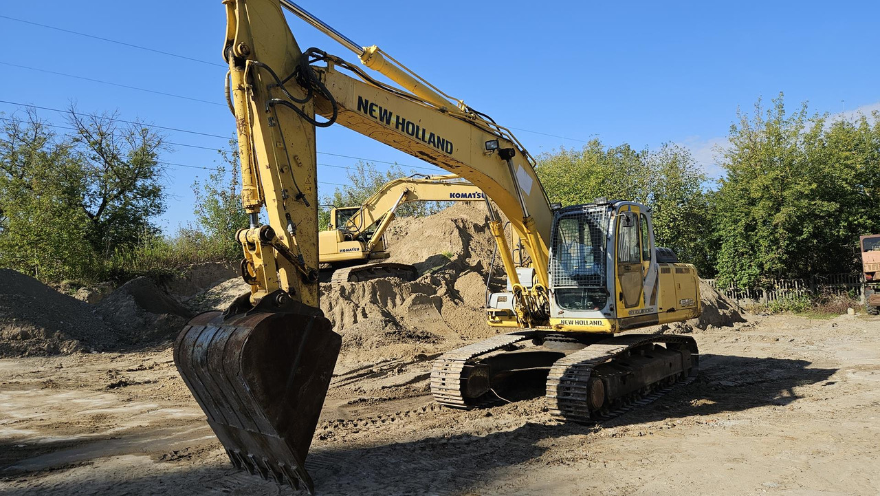 NEW HOLLAND E 245 B - Excavadora de cadenas: foto 1 NEW HOLLAND E 245 B - Excavadora de cadenas: foto 1