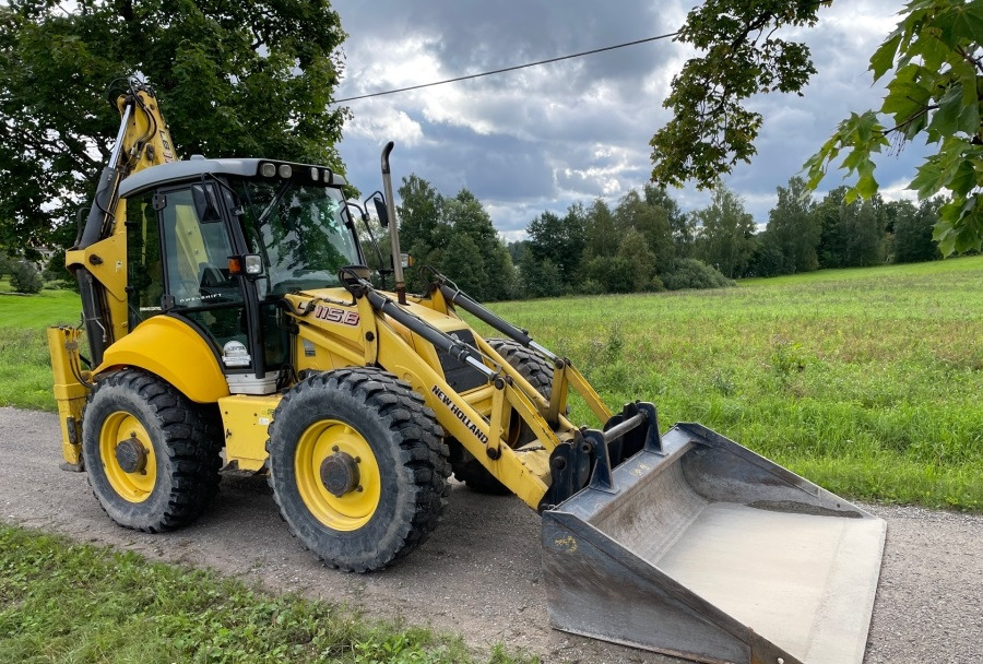 NEW HOLLAND LB115B - Maquinaria de construcción: foto 1 NEW HOLLAND LB115B - Maquinaria de construcción: foto 1