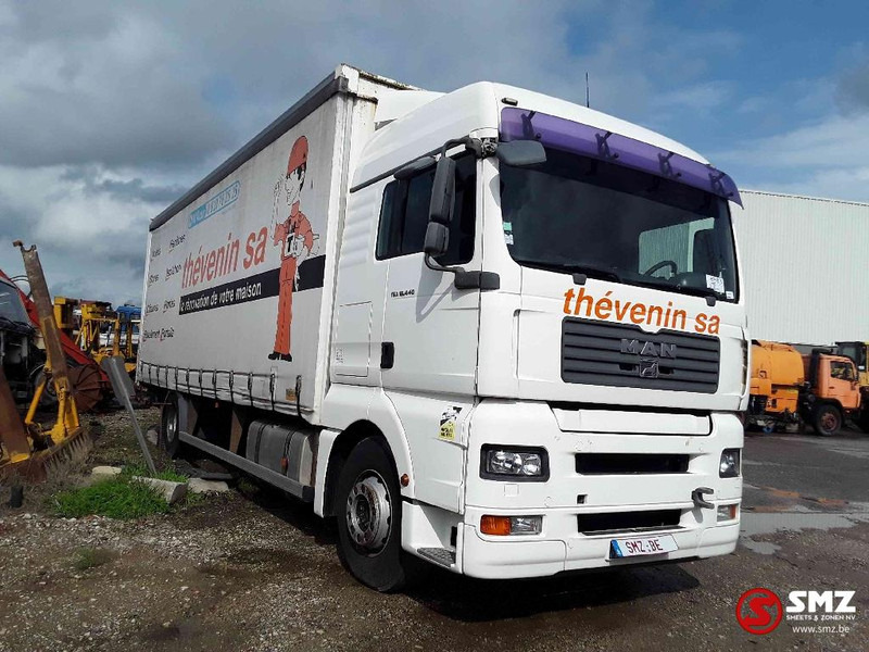 MAN TGA 18.440 - Camión lona: foto 1 MAN TGA 18.440 - Camión lona: foto 1