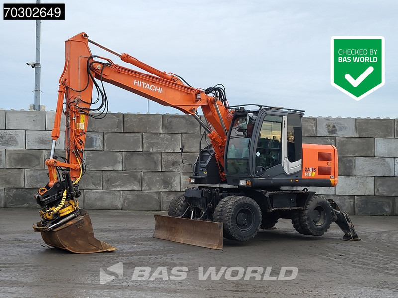 Hitachi ZX140W -3 - Excavadora de ruedas: foto 1 Hitachi ZX140W -3 - Excavadora de ruedas: foto 1