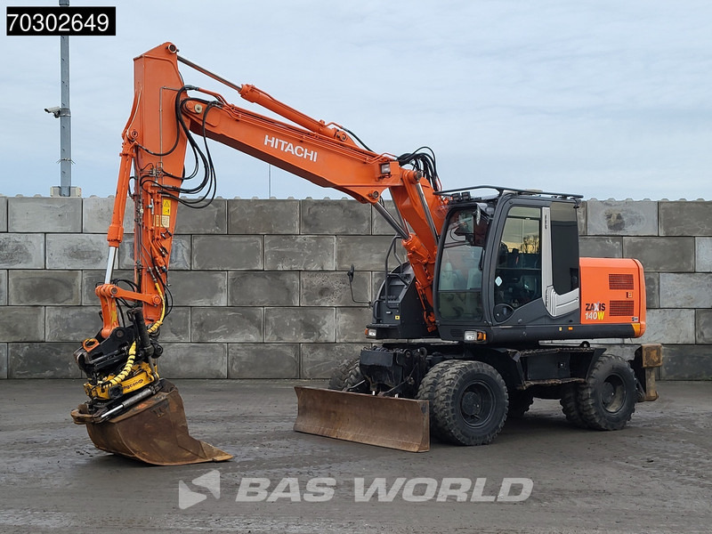 Hitachi ZX140W -3 - Excavadora de ruedas: foto 2 Hitachi ZX140W -3 - Excavadora de ruedas: foto 2
