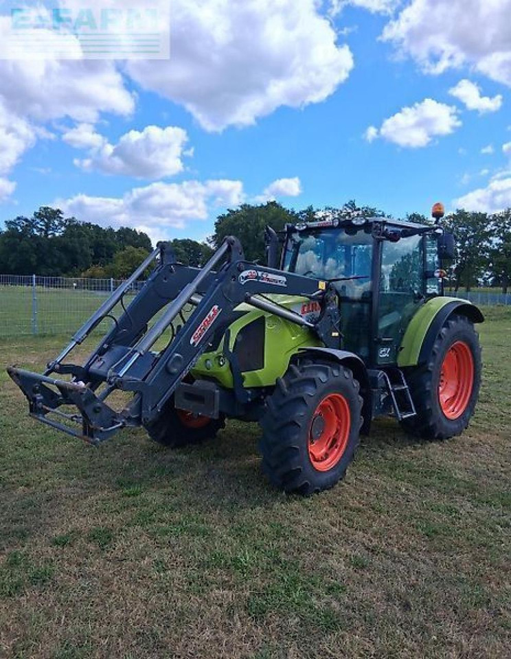 CLAAS axos 320 - Tractor: foto 1 CLAAS axos 320 - Tractor: foto 1