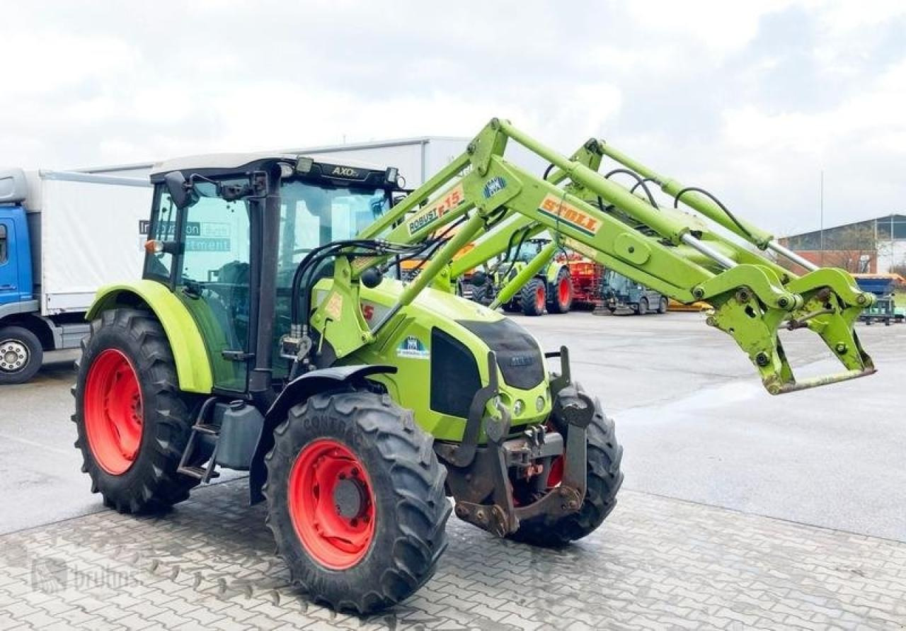 CLAAS axos 320 mit stoll frontlader - Tractor: foto 1 CLAAS axos 320 mit stoll frontlader - Tractor: foto 1