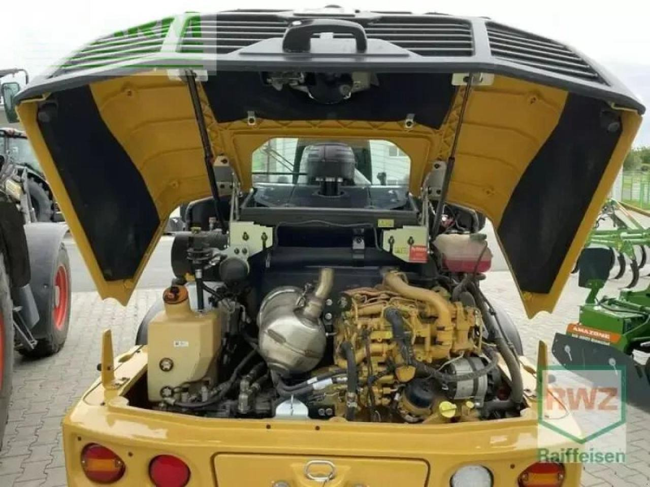 Miniexcavadora Caterpillar 906 radlader: foto 9 Miniexcavadora Caterpillar 906 radlader: foto 9