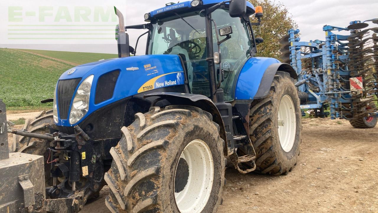 New Holland T7050 - Tractor: foto 1 New Holland T7050 - Tractor: foto 1