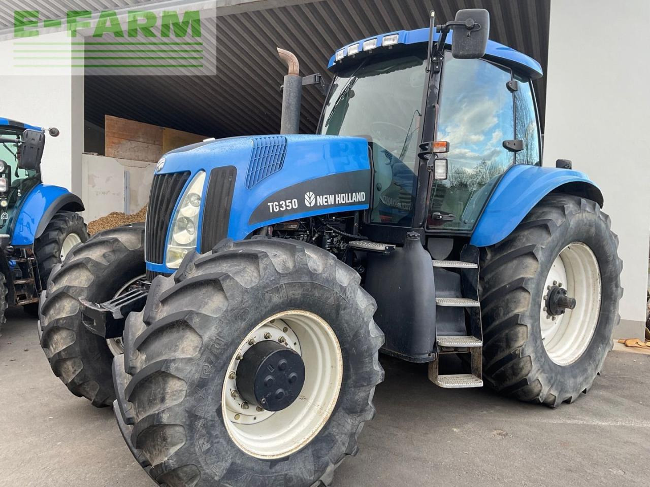 New Holland TG 285 - Tractor: foto 1 New Holland TG 285 - Tractor: foto 1