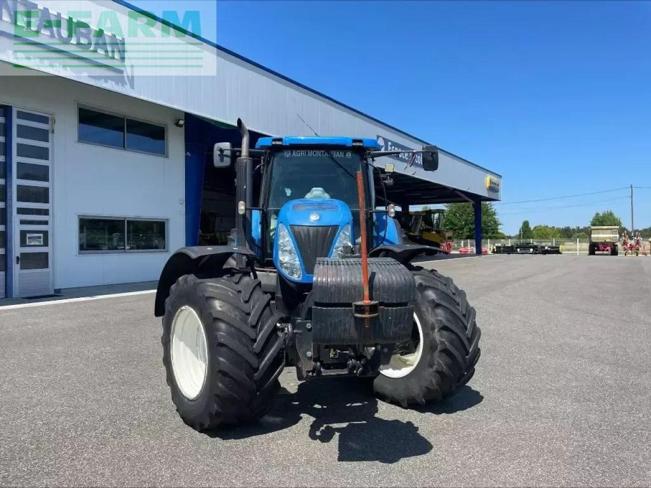 New Holland t 7050 - Tractor: foto 2 New Holland t 7050 - Tractor: foto 2