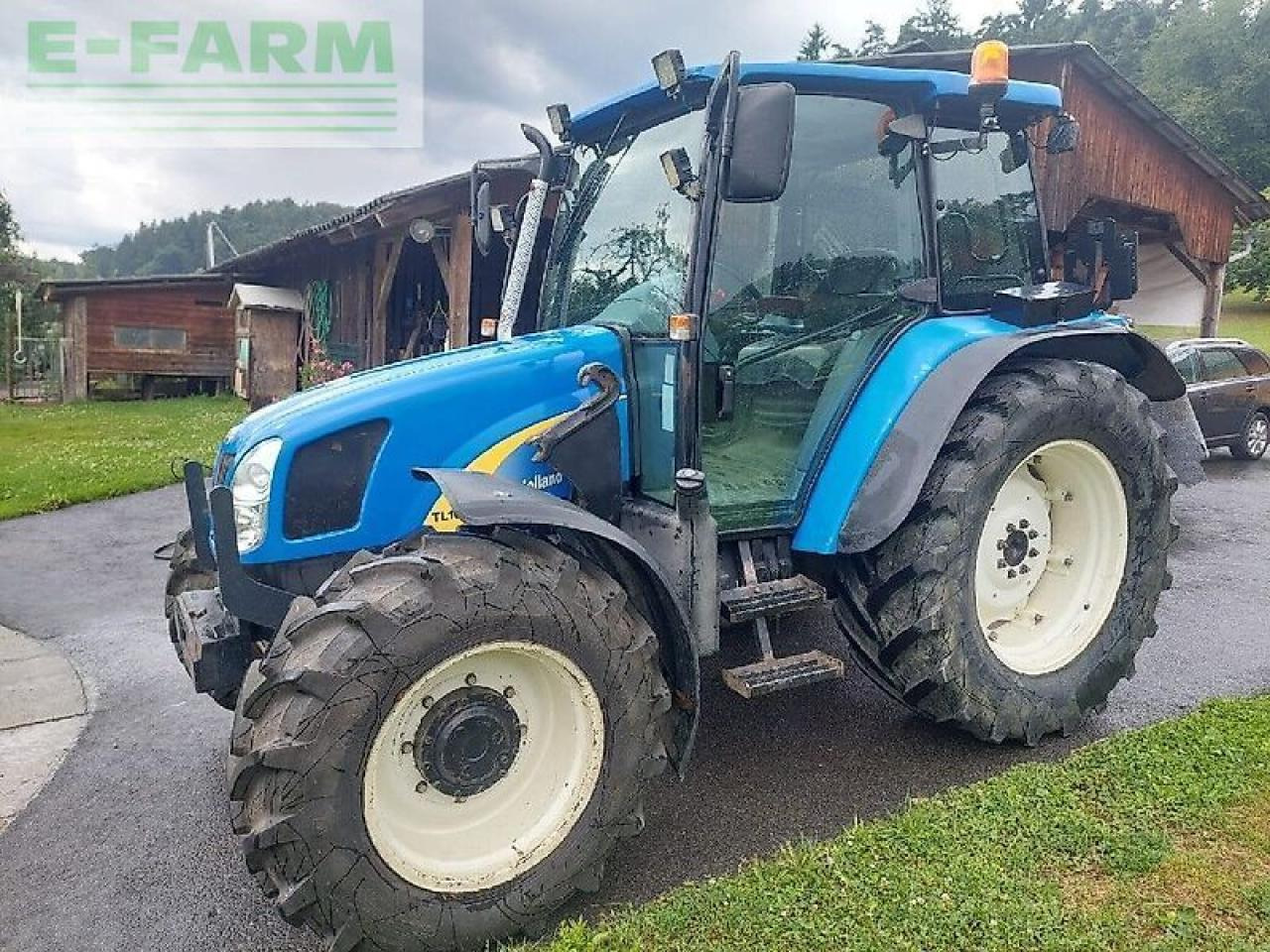 New Holland tl 90 a A - Tractor: foto 2 New Holland tl 90 a A - Tractor: foto 2