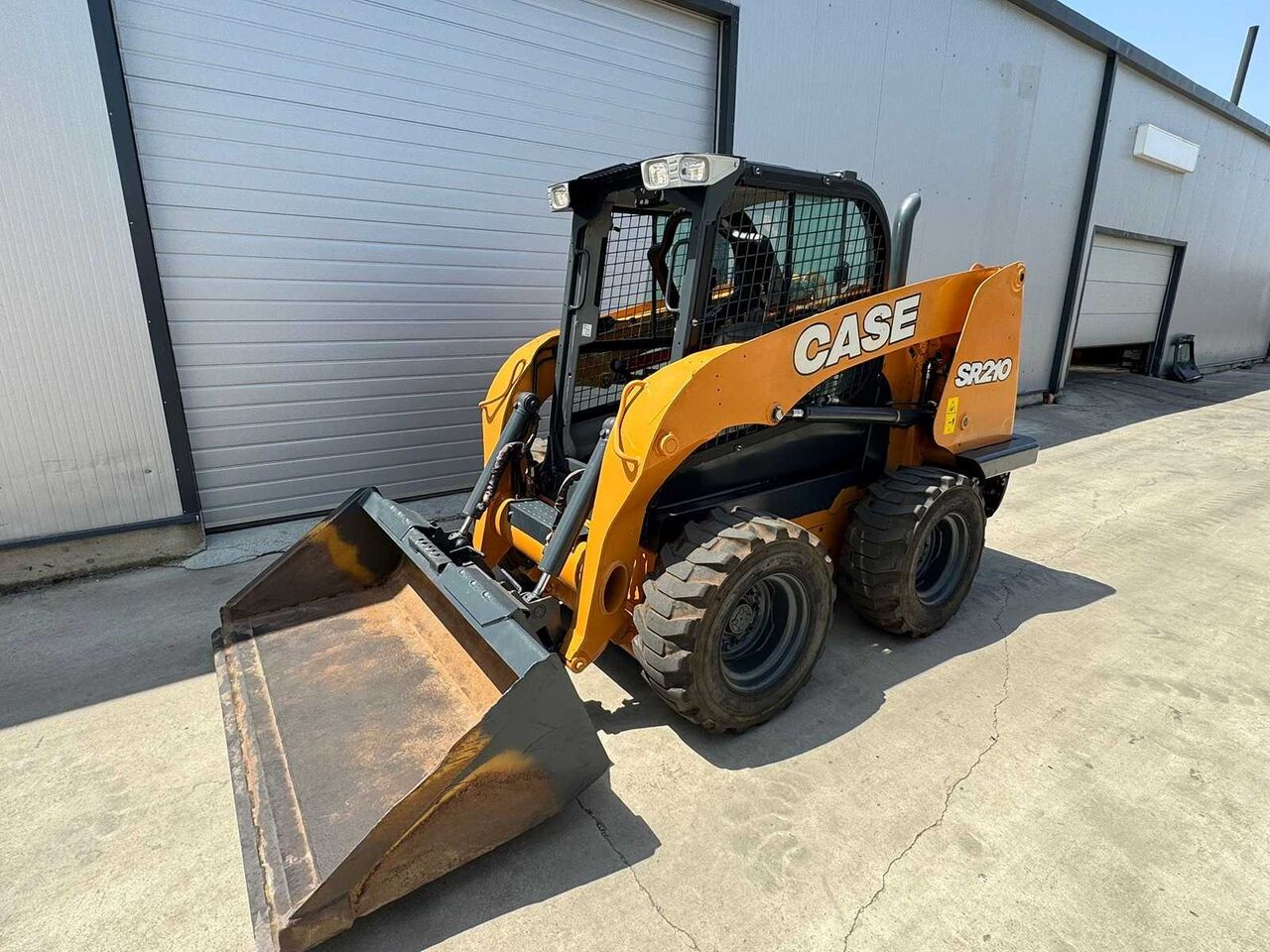 CASE SR210 COMPACT LOADER WITH RADIAL LIFT GEOMETRY - Minicargadora de cadenas: foto 1 CASE SR210 COMPACT LOADER WITH RADIAL LIFT GEOMETRY - Minicargadora de cadenas: foto 1