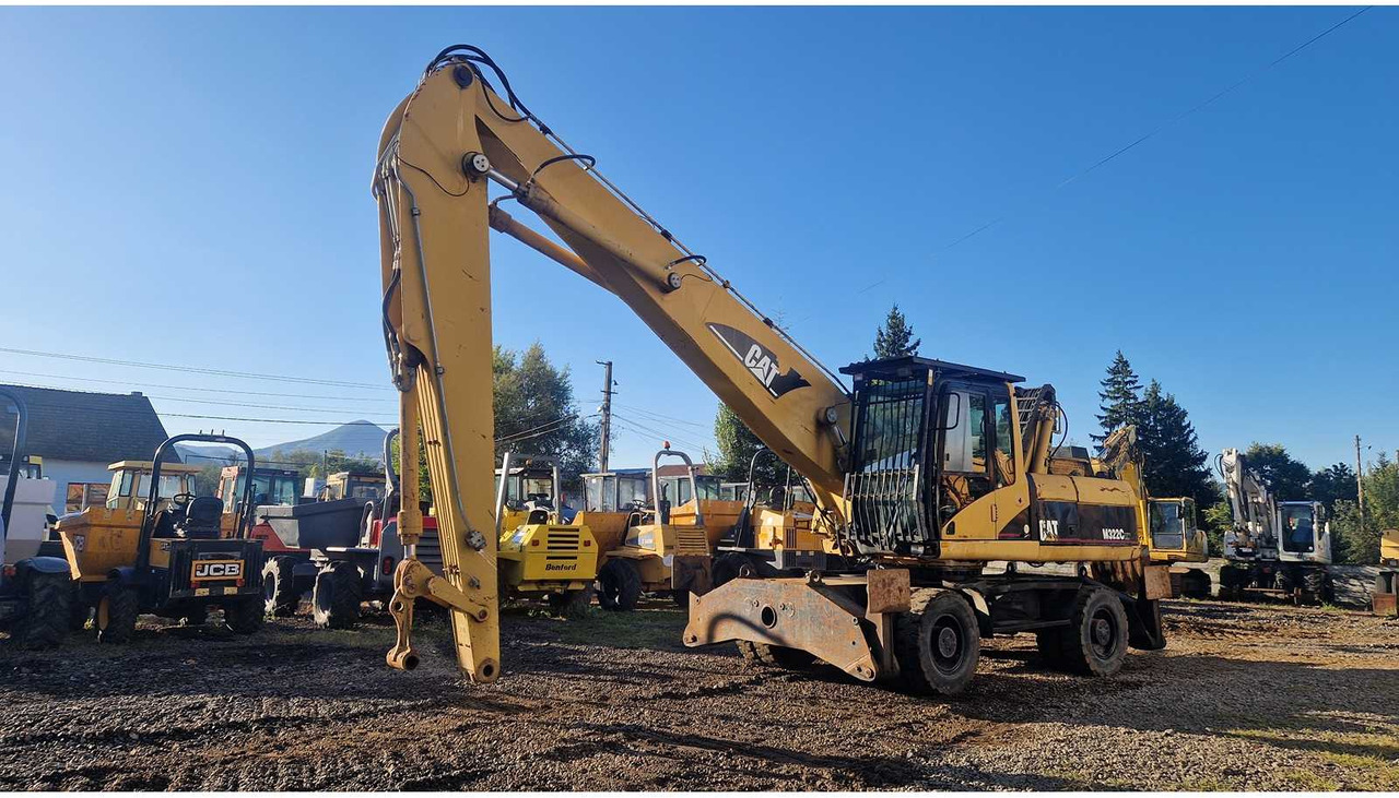 Caterpillar CATERPILLAR - M322C - WHEELED EXCAVATOR - 2003 - Excavadora de ruedas: foto 1 Caterpillar CATERPILLAR - M322C - WHEELED EXCAVATOR - 2003 - Excavadora de ruedas: foto 1