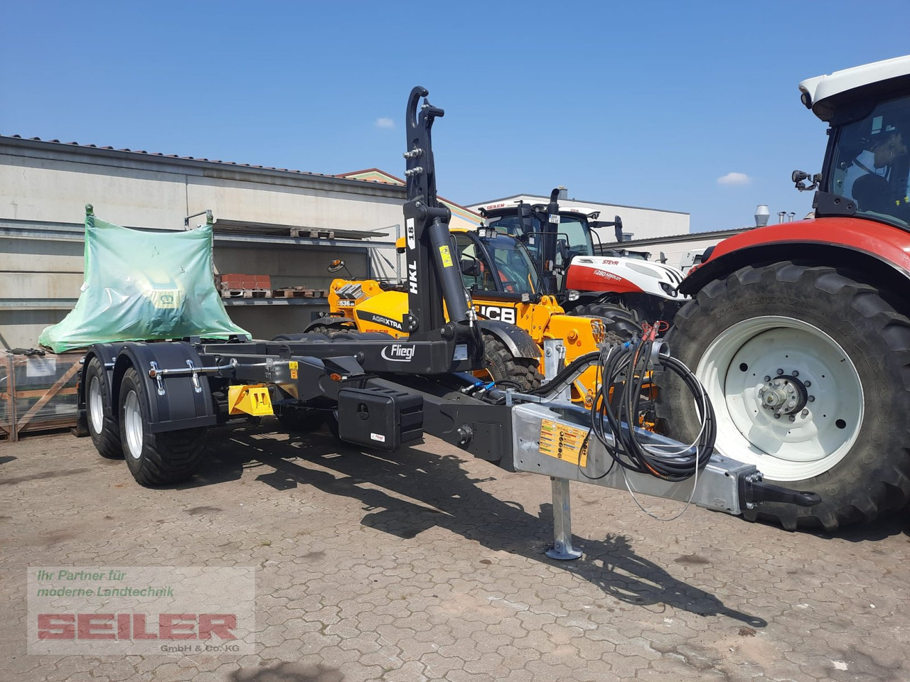Fliegl HKL 18 Abrollkipper - Remolque multilift/ Portacontenedores de cadenas: foto 1 Fliegl HKL 18 Abrollkipper - Remolque multilift/ Portacontenedores de cadenas: foto 1