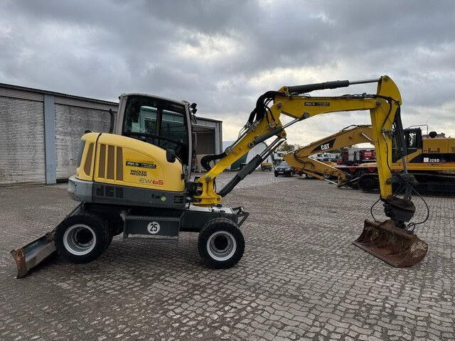 Neuson EW65, Verstellausleger, Hydr. S.W.S.,Div. Löffel - Excavadora de ruedas: foto 5 Neuson EW65, Verstellausleger, Hydr. S.W.S.,Div. Löffel - Excavadora de ruedas: foto 5