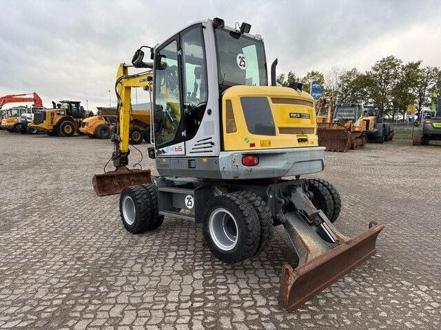 Neuson EW65, Verstellausleger, Hydr. S.W.S.,Div. Löffel - Excavadora de ruedas: foto 3 Neuson EW65, Verstellausleger, Hydr. S.W.S.,Div. Löffel - Excavadora de ruedas: foto 3