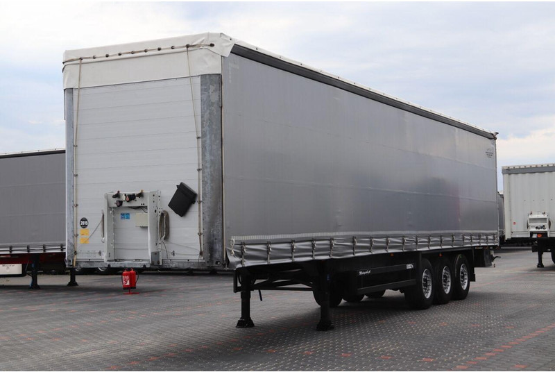 Schmitz Cargobull CURTAINSIDER / STANDARD / LIFTED AXLE / XL CODE / - Semirremolque lona: foto 1 Schmitz Cargobull CURTAINSIDER / STANDARD / LIFTED AXLE / XL CODE / - Semirremolque lona: foto 1