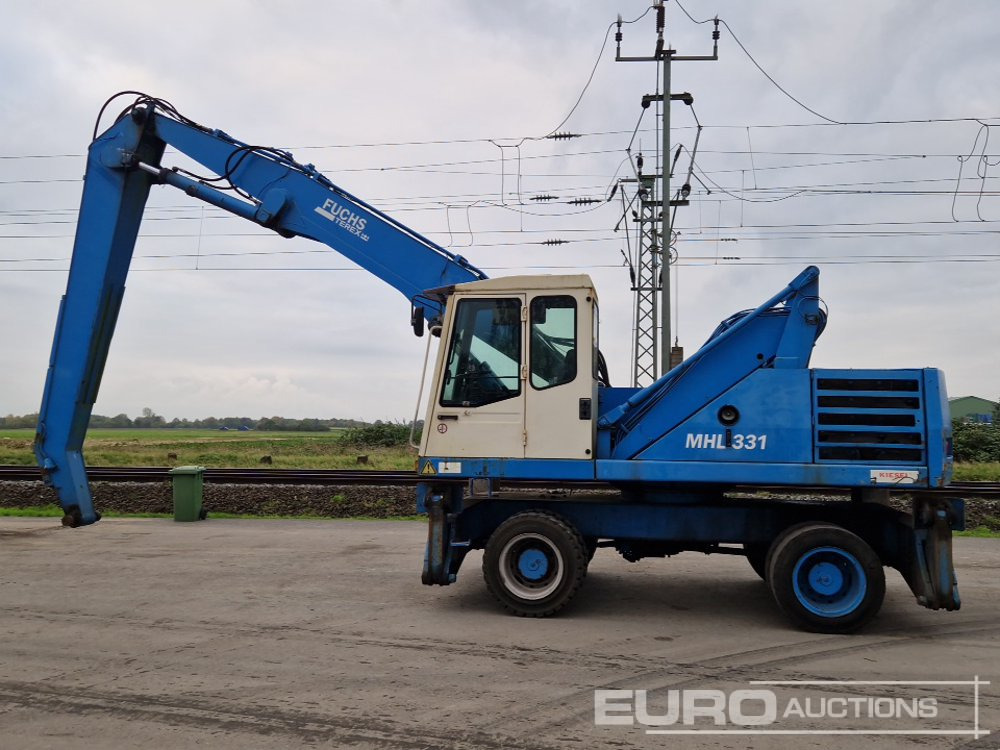 Fuchs MHL331 - Excavadora de ruedas: foto 2 Fuchs MHL331 - Excavadora de ruedas: foto 2