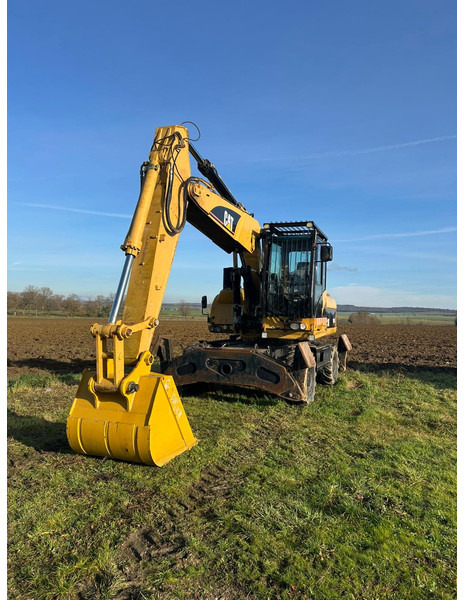 Caterpillar M322D VAH - Excavadora de ruedas: foto 1 Caterpillar M322D VAH - Excavadora de ruedas: foto 1