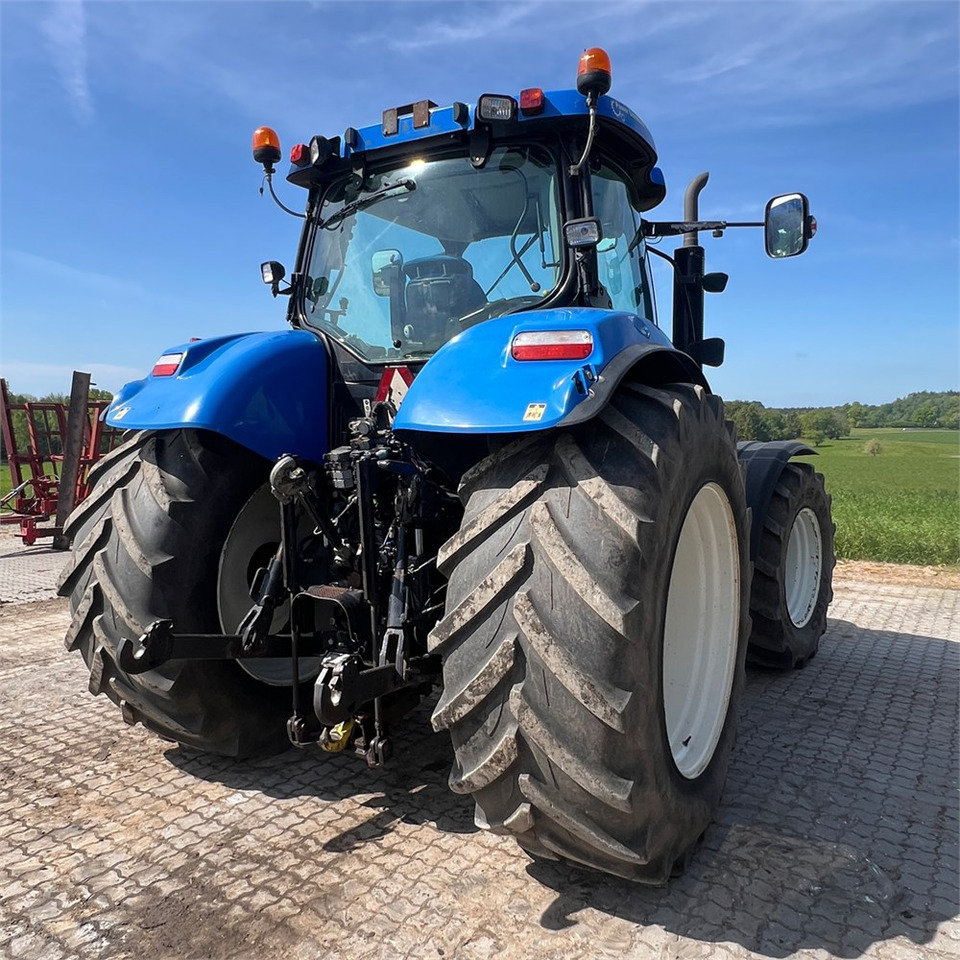 New Holland T6050 - Tractor: foto 5 New Holland T6050 - Tractor: foto 5