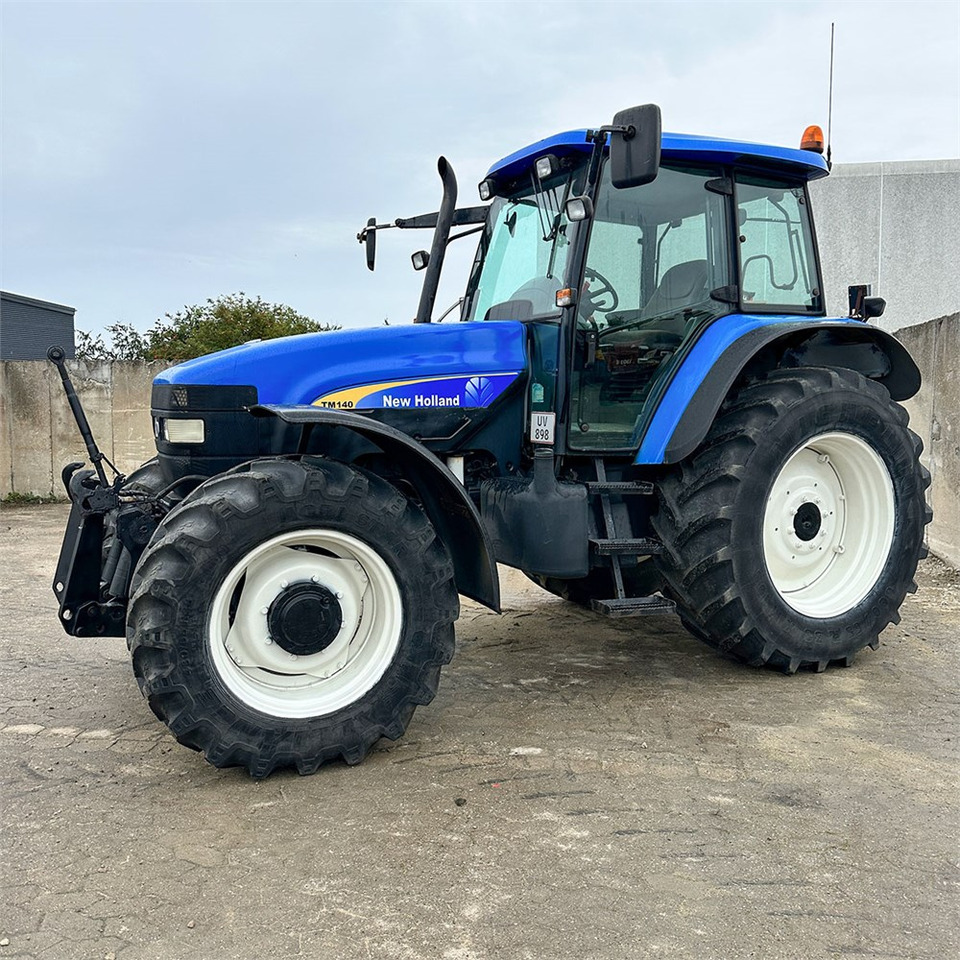 New Holland TM140 - Tractor: foto 1 New Holland TM140 - Tractor: foto 1